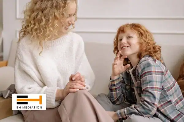 Happy mother and child after sorting child arrangements mediation New Milton